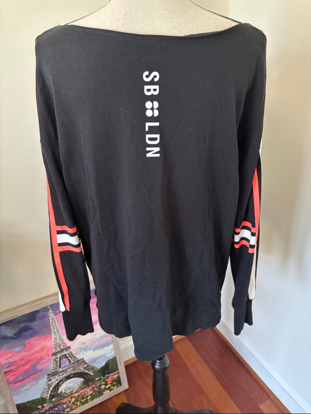 Sweaty Betty Black Long-Sleeve Top with Orange and White Sleeve Stripes - Picture 4 of 4
